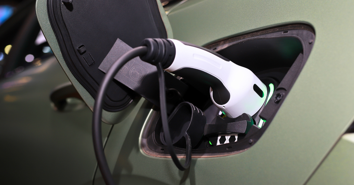 Level 2 EV charger plugged into an electric vehicle during home charging in Ontario