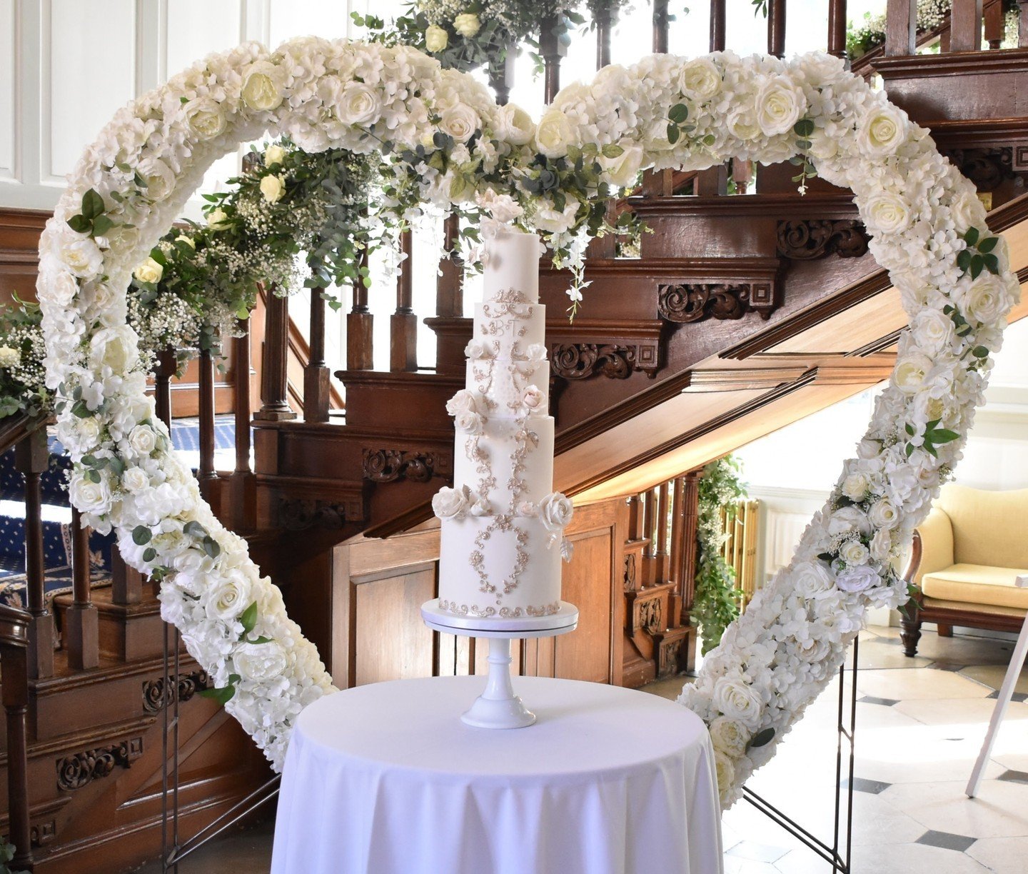 Super tall, super elegant and very fitting for @gosfieldhallweddingvenue. 
🤍
It's so important that your cake design is in keeping with its' surroundings and my brief for this cake for Bridgette &amp; Tom, was to incorporate the incredible decorativ