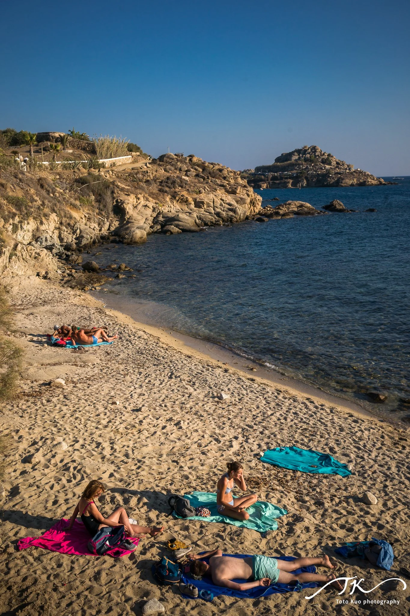 Sailing and boat cruise photo opportunities around Mykonos, integrated into a 3–5 day itinerary with tips for sea-level and aerial photography of coastlines.