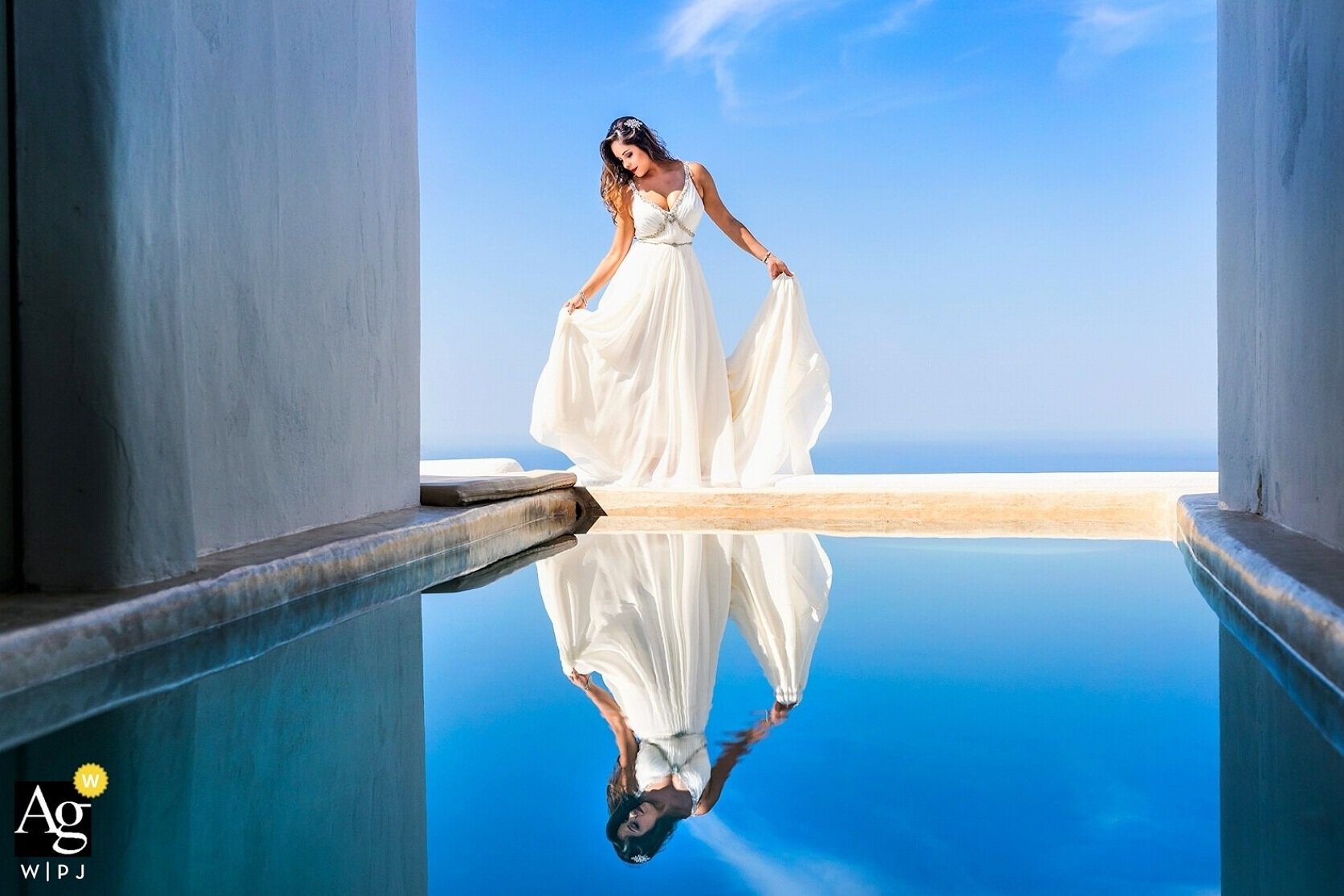 Santorini wedding photographer with more than 10 years wedding photo shooting experience. A unique photography session on the most beautiful island Santorini. Discover the highlights and hidden gems of Santorini.Flying Dress Photoshoot in Santorini.…