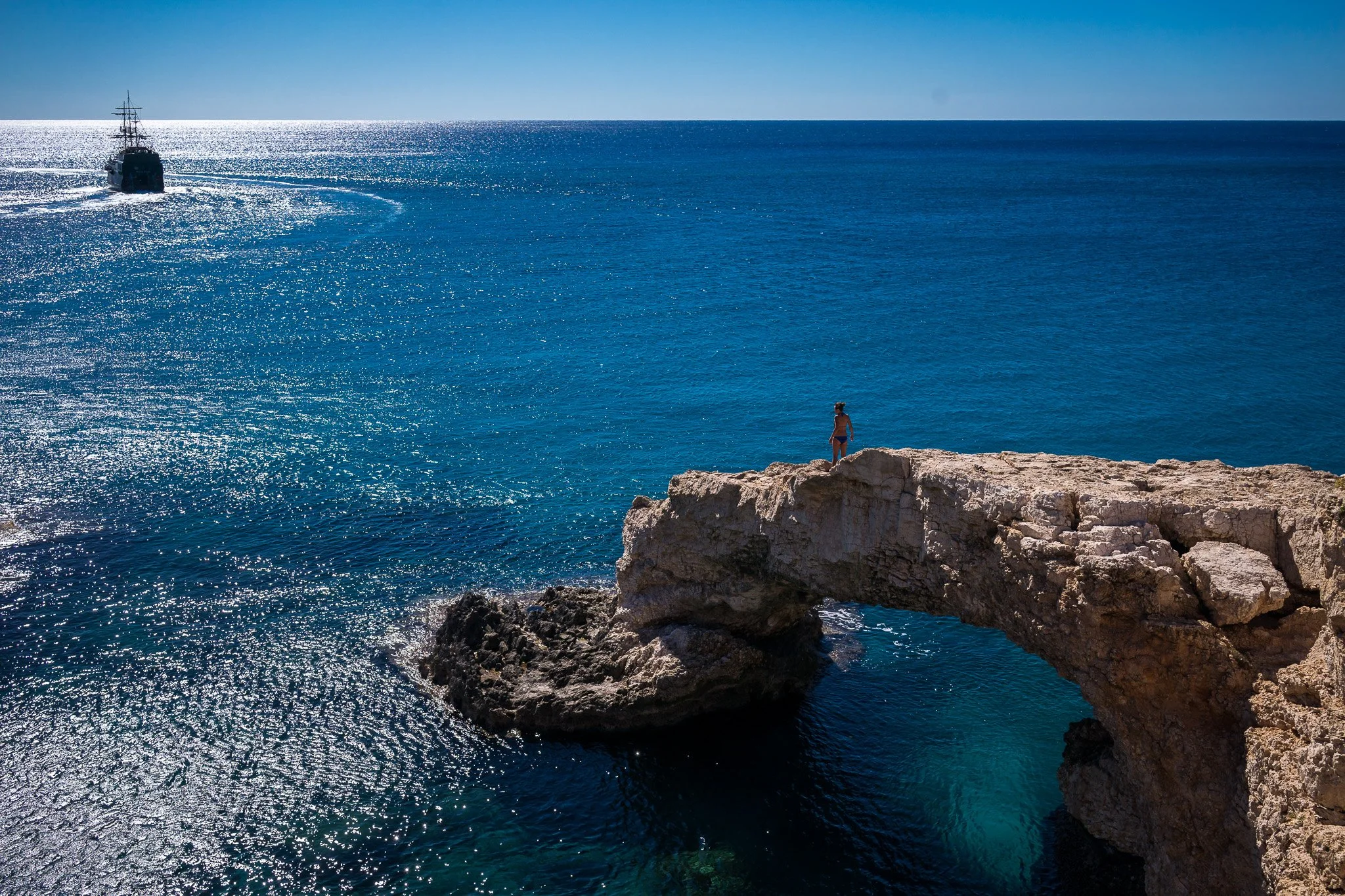 Cape Greco sea caves and cliff trail panorama — dramatic coastal landscape near Ayia Napa ideal for long-exposure seascapes and cliffside hiking shots.