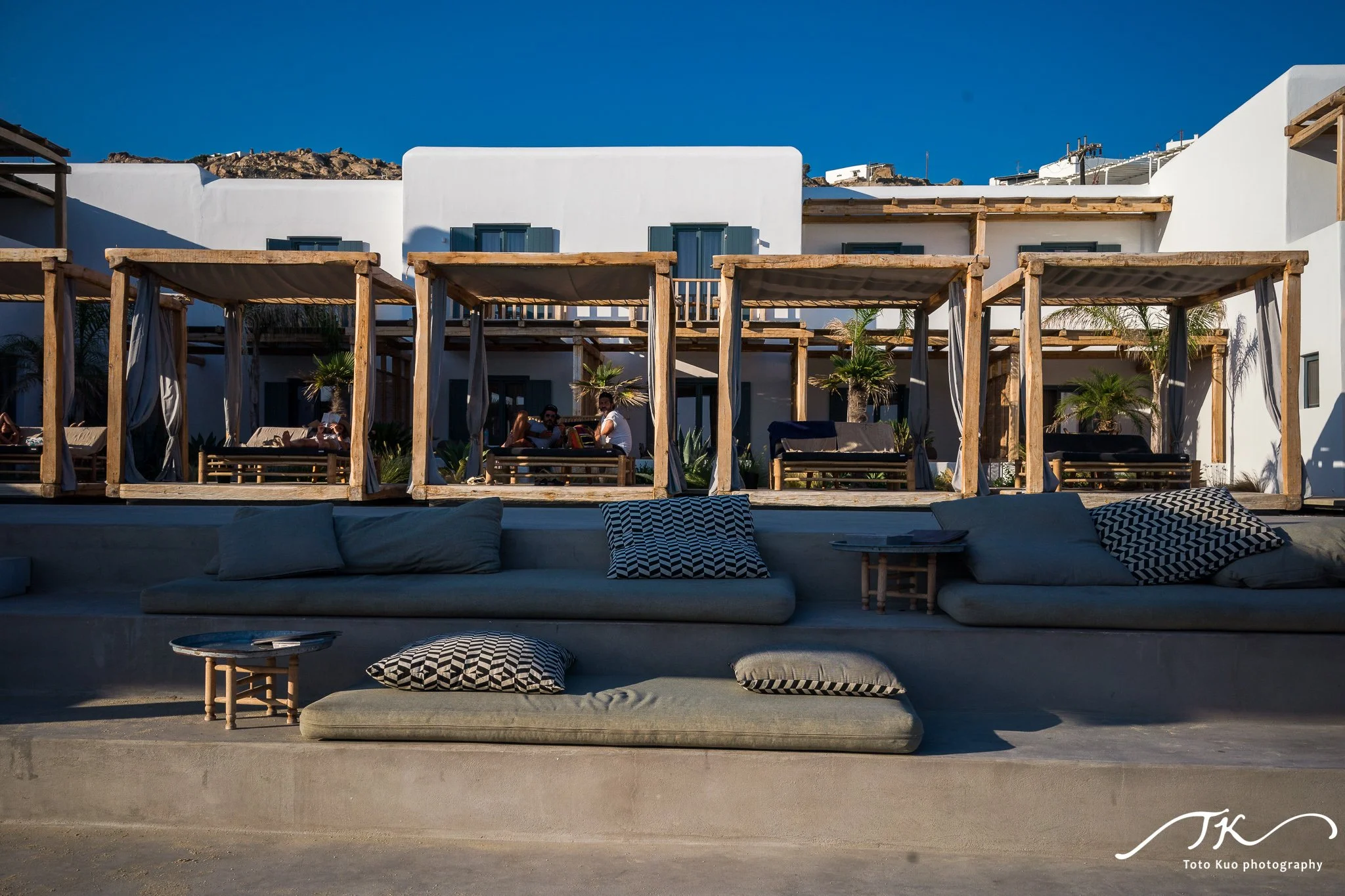 Post-processing and color grading guide for Mykonos travel photos—recommended Lightroom presets and editing workflow to enhance blue-and-white island tones.