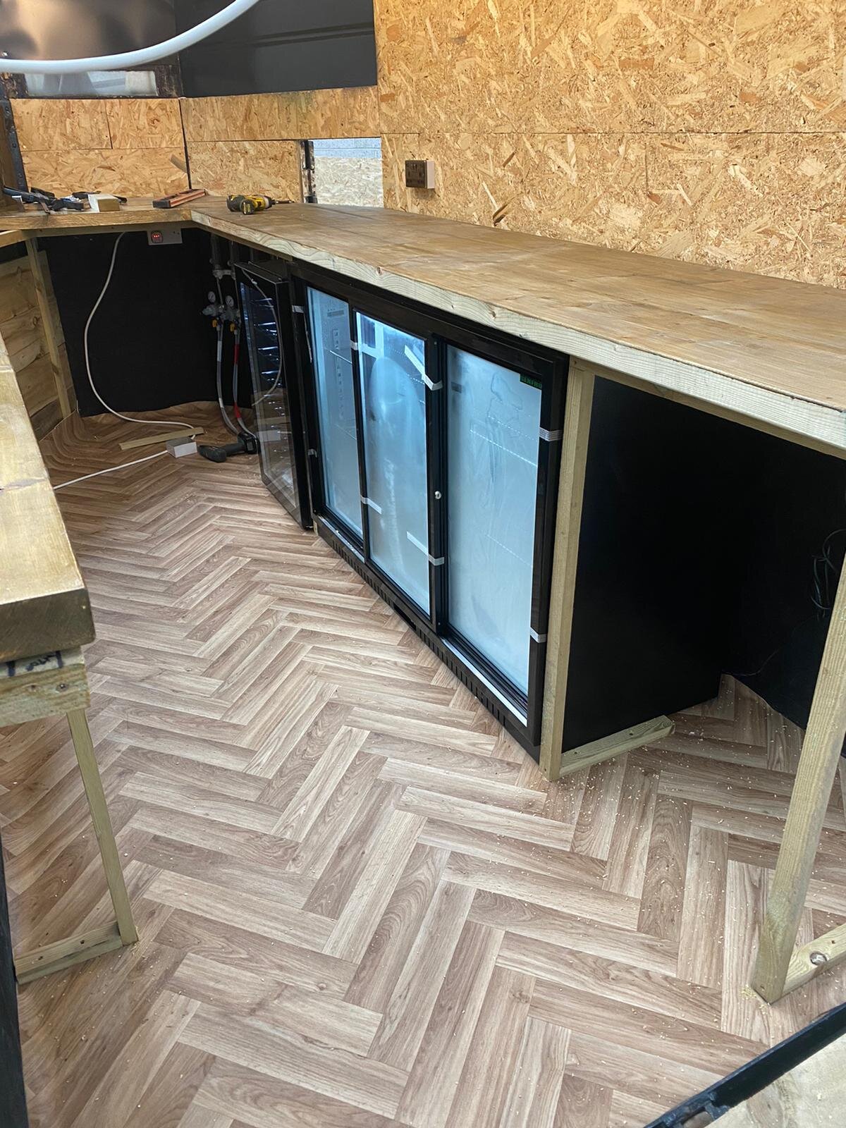 Triple fridges going in