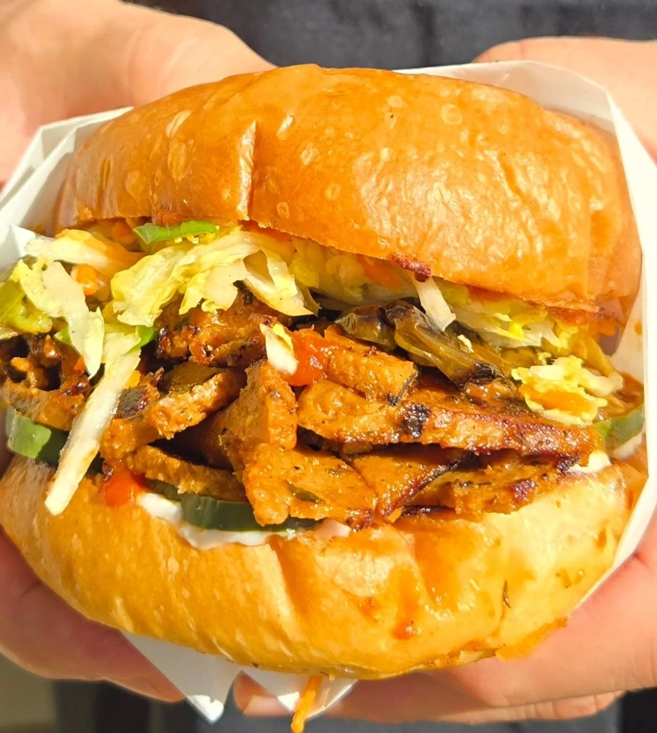 BBQ Seitan sandwich special available now! Our housemade seitan, bbq sauce, toum, and pickles on brioche. Plus some roasted shishito peppers and a napa cabbage slaw. Available for the next several days or until we sell out:)