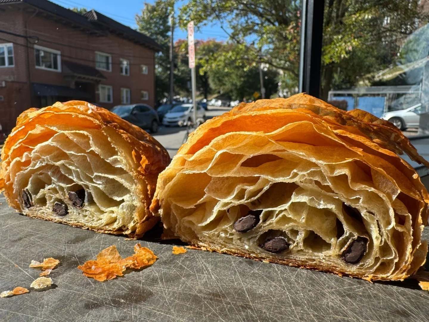 Good morning 🙂 
Chocolate croissant in the window. Great lamination on this one. As it gets cooler, our croissant work improves. Working with our house made vegan butter in the summer is a challenge 😬 
We've been selling out of croissants early o