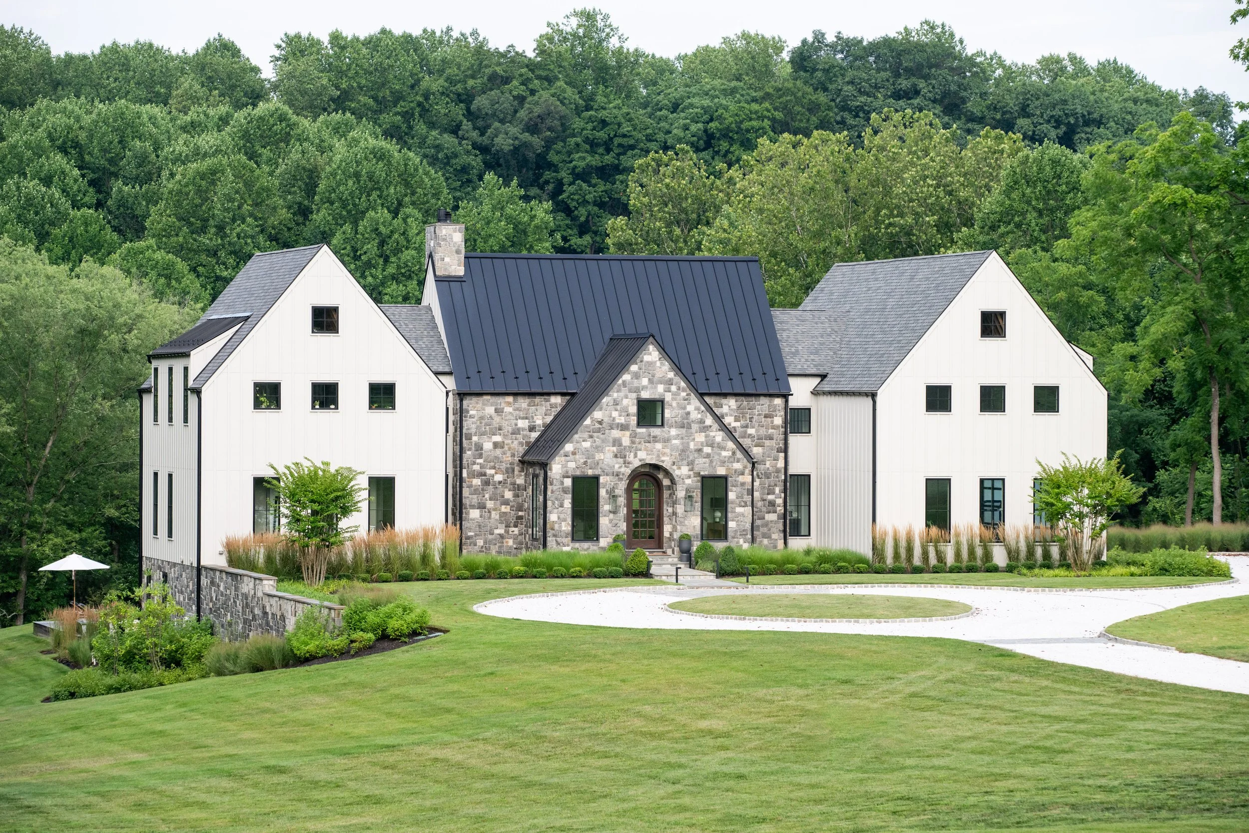 Modern Tudor country home in the hills of Maryland, gardens designed by FORM Garden Design.