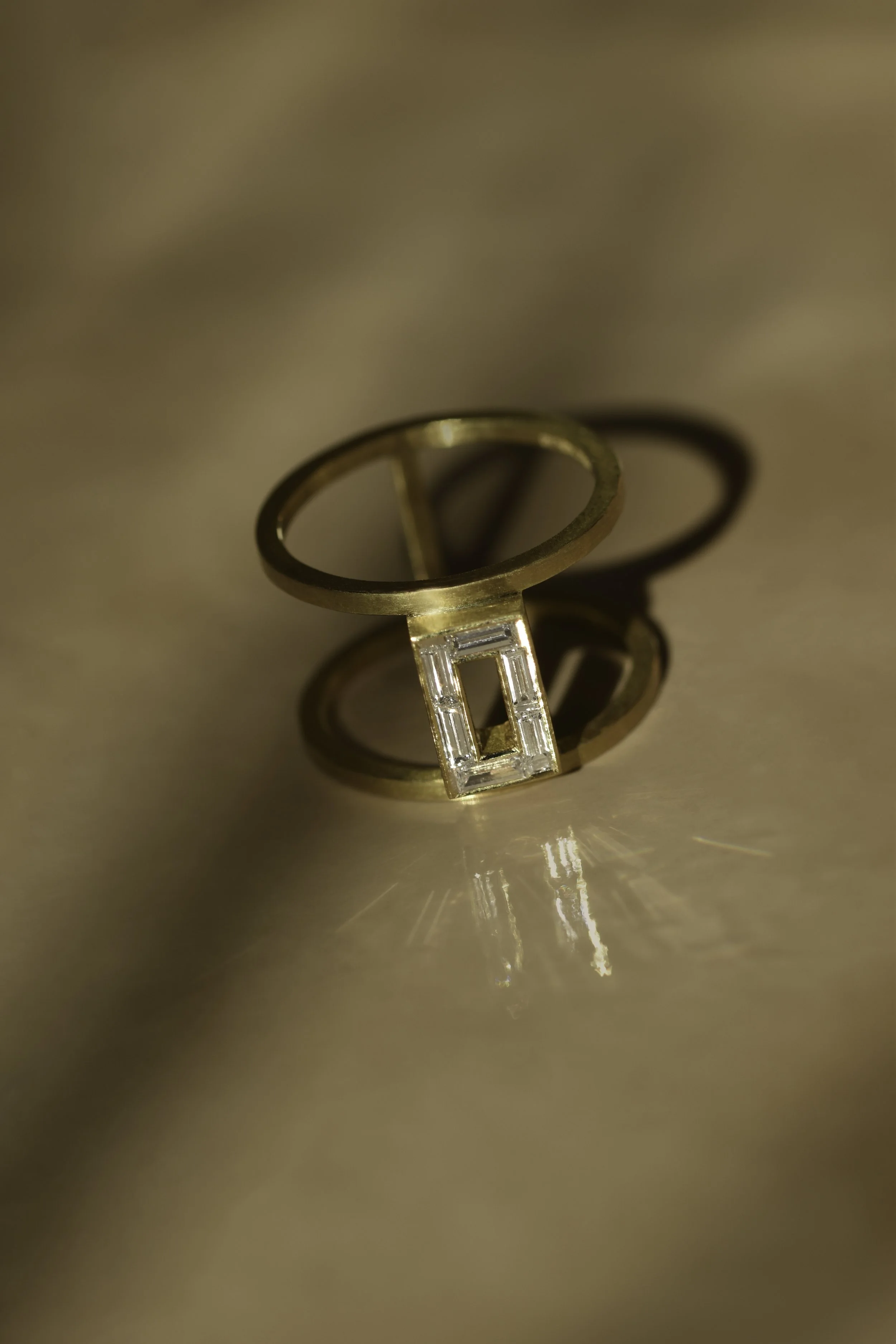 Baguette diamonds, 18ct gold ring.