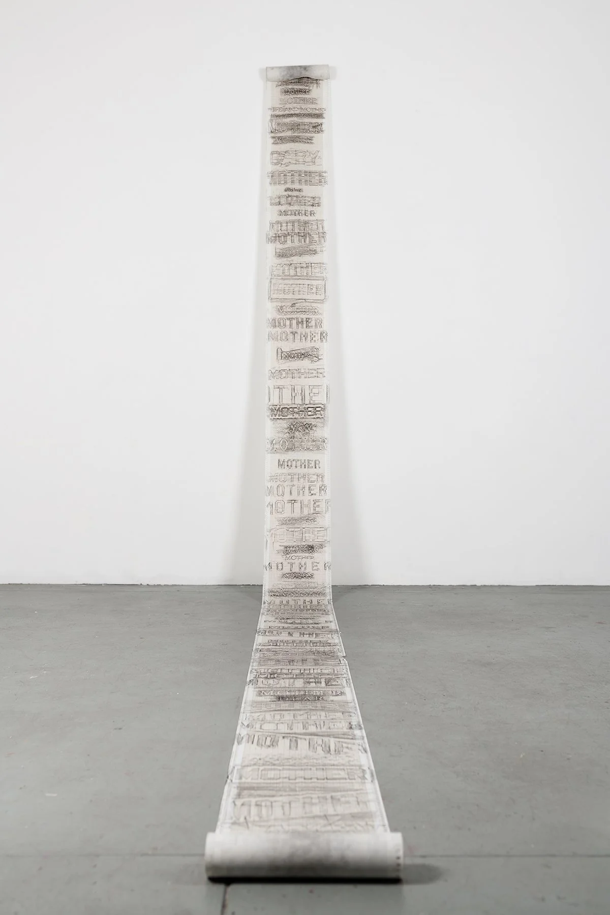 The Mother Rubbings, 12” w x 150’ length, “mother” grave rubbings, graph paper, 2020