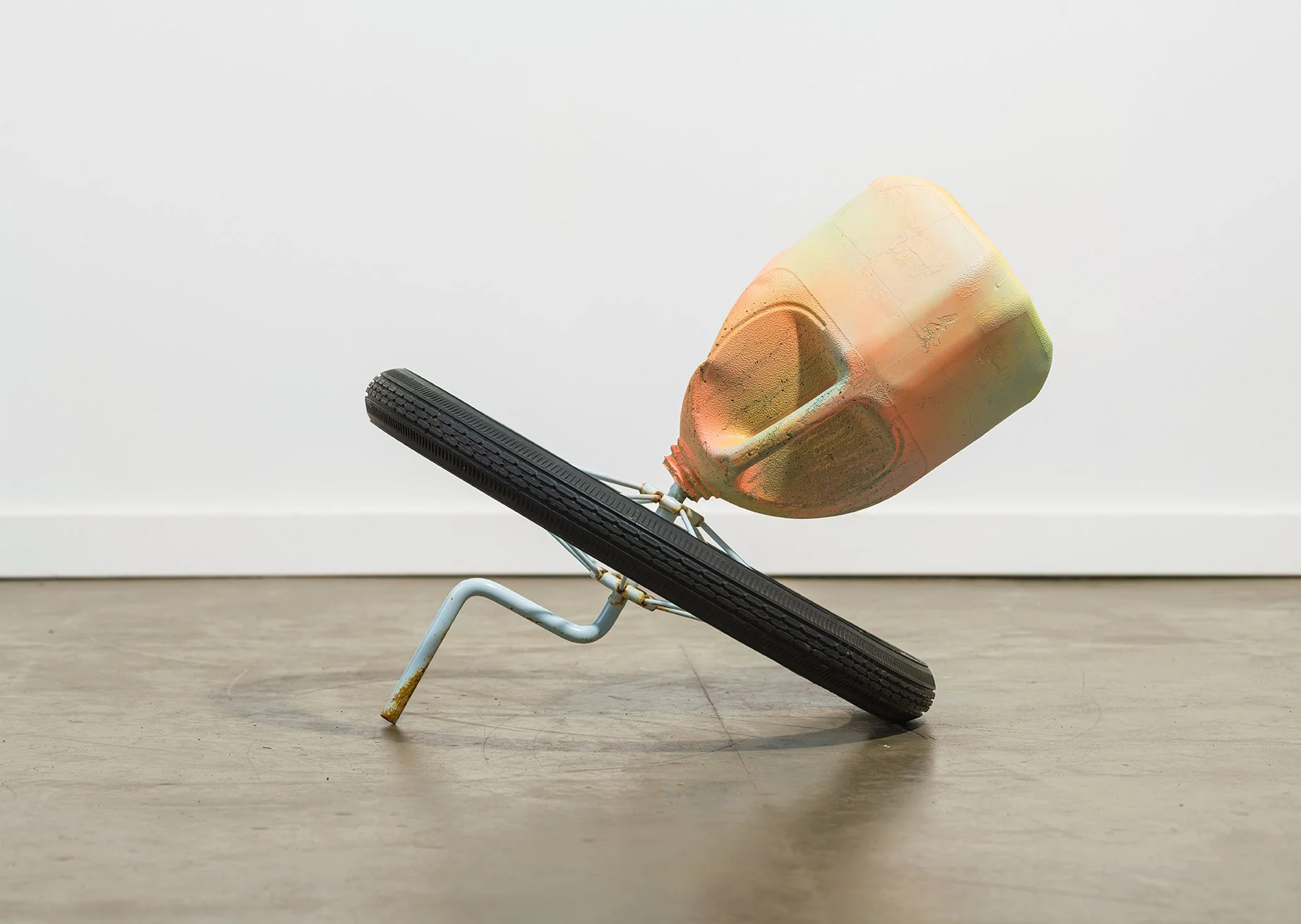 Diet and Exercise. Cement, tricycle wheel, acrylic paint. 16”x16”x13.5” 2020