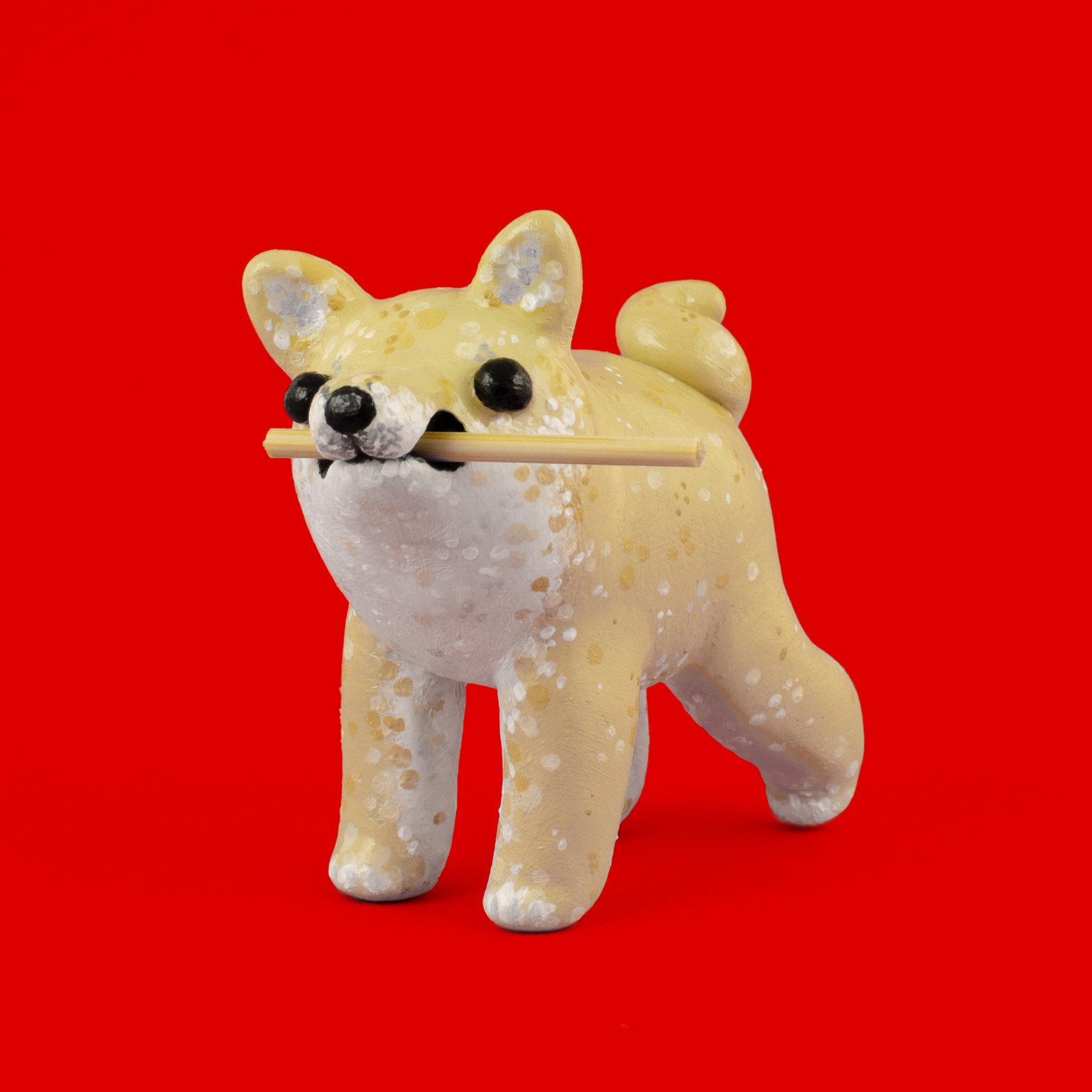 Tiny blue polymer clay shiba inu sculpture