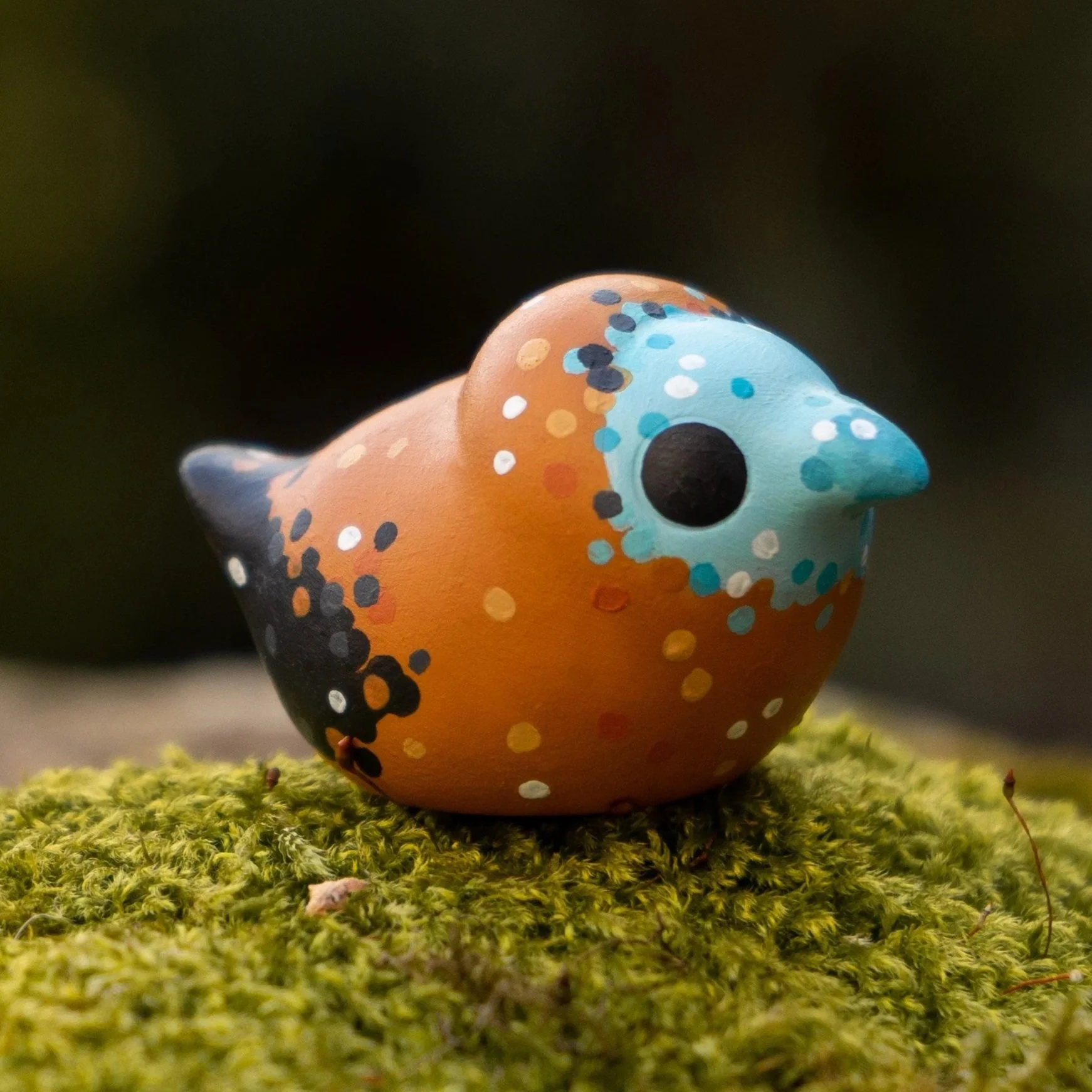 Tiny blue polymer clay bird sculpture