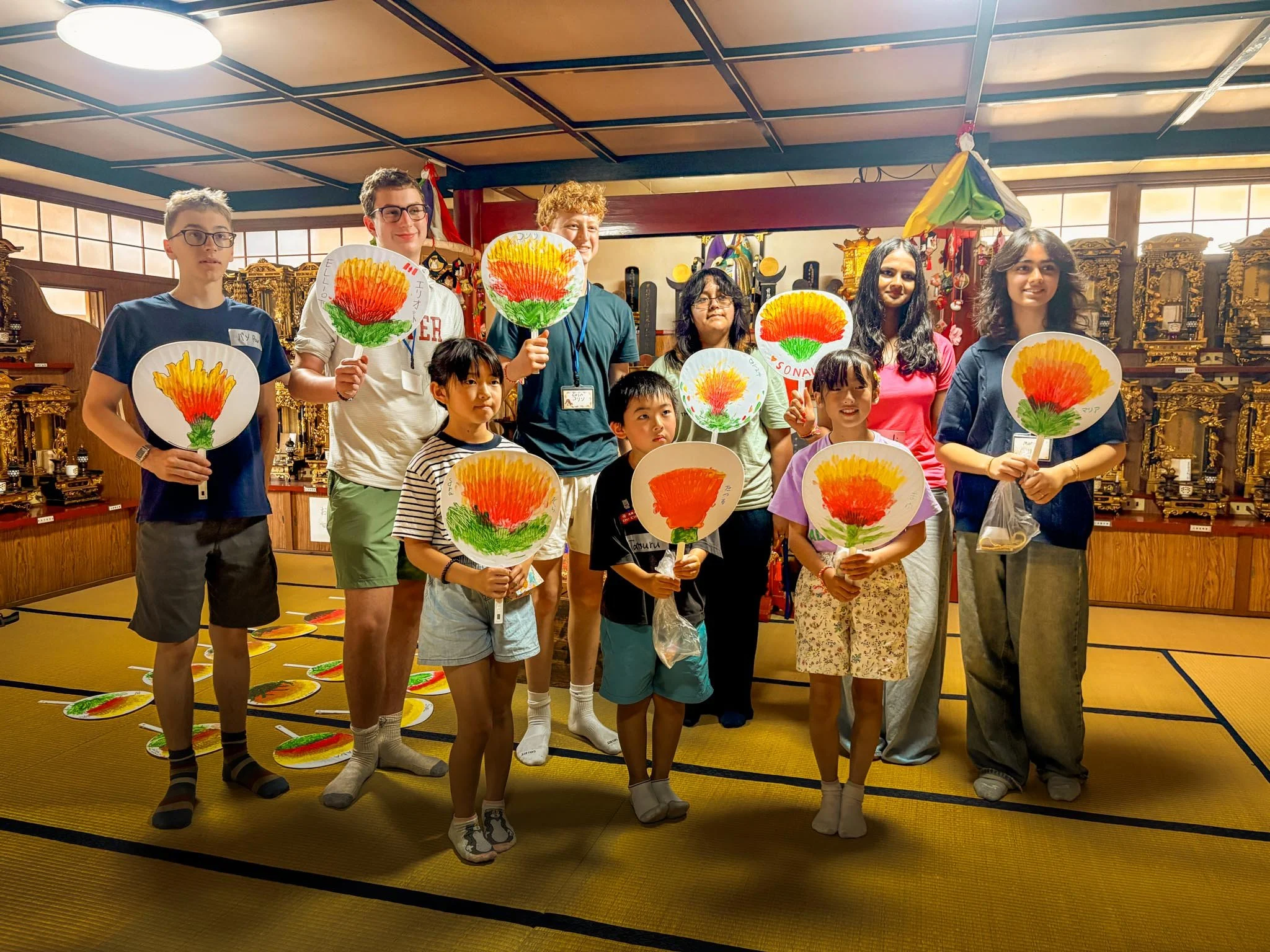   Making uchiwa fans with local students.  