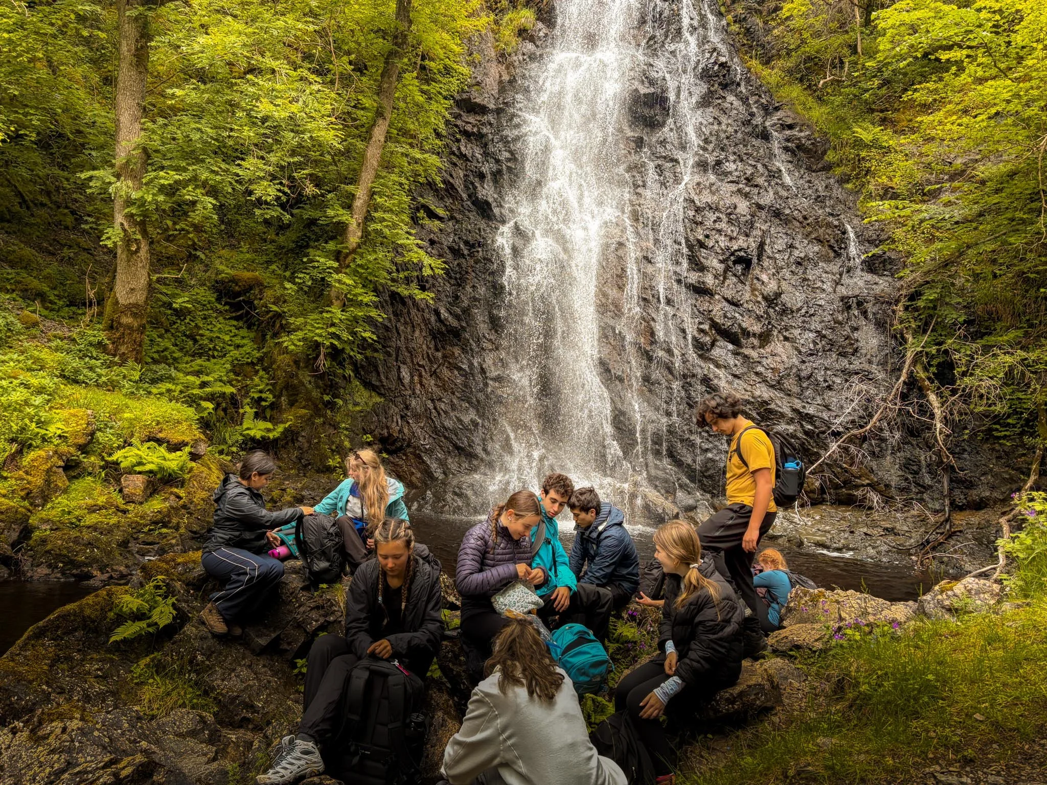  Eating lunch beside a Highland waterfall. 