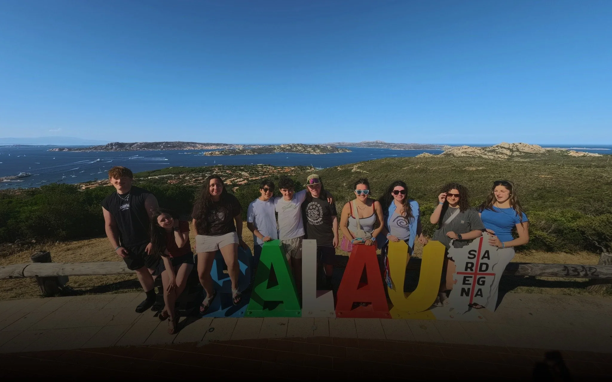  Taking in the Sardinian coast with your group from the Palau overlook. 