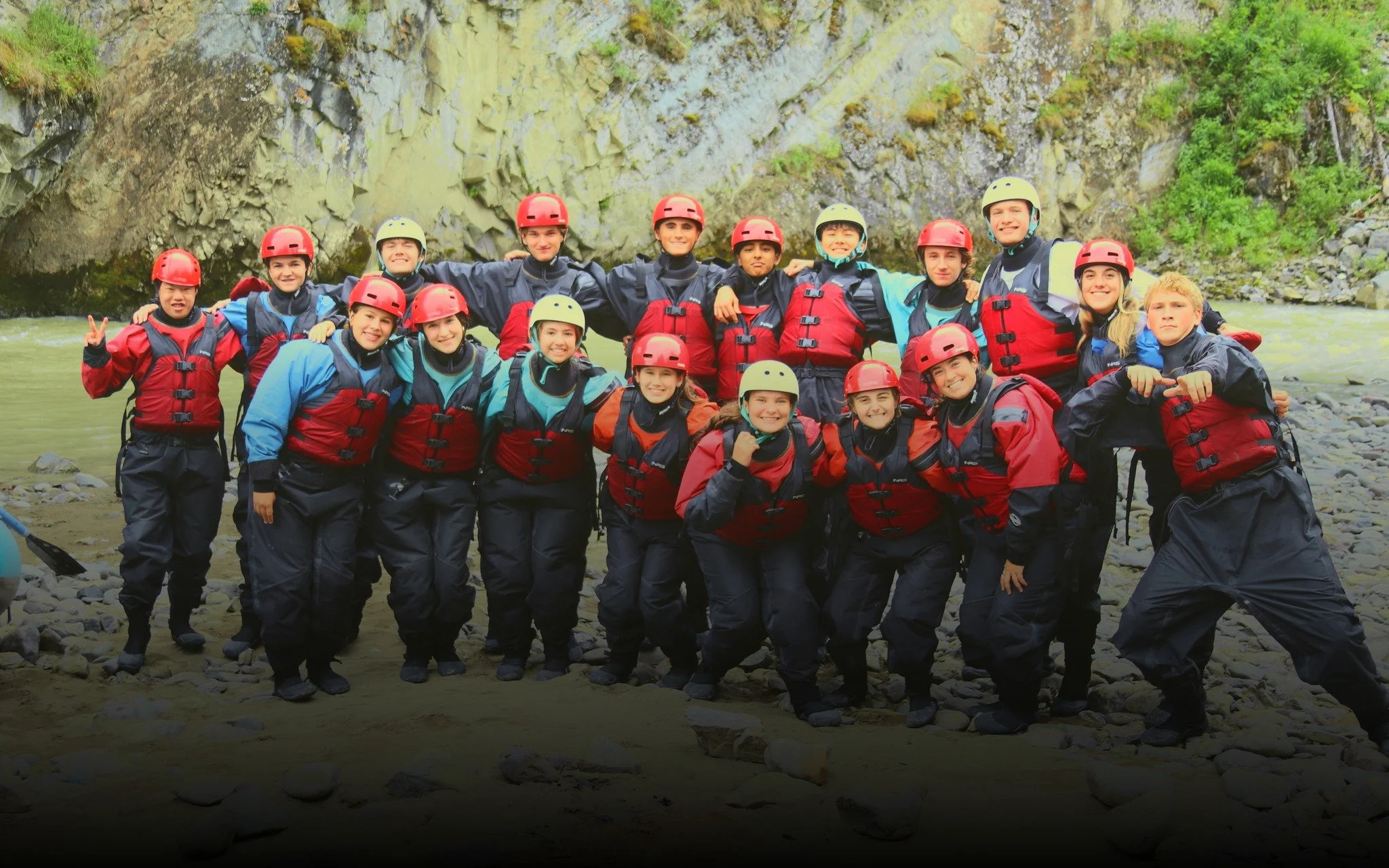  The whole crew geared up and grinning after rafting. 
