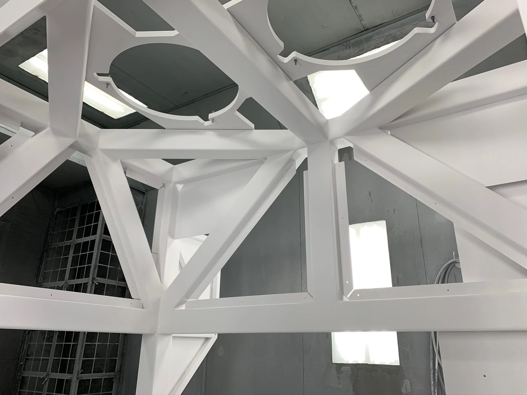 Close up inside a large powder coated frame before cure