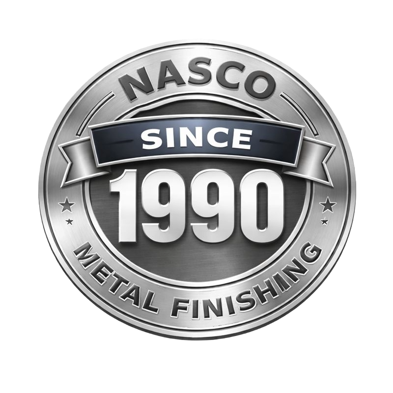 A silver medal or badge with the words 'NASCO SINCE 1990 METAL FINISHING' engraved on it.