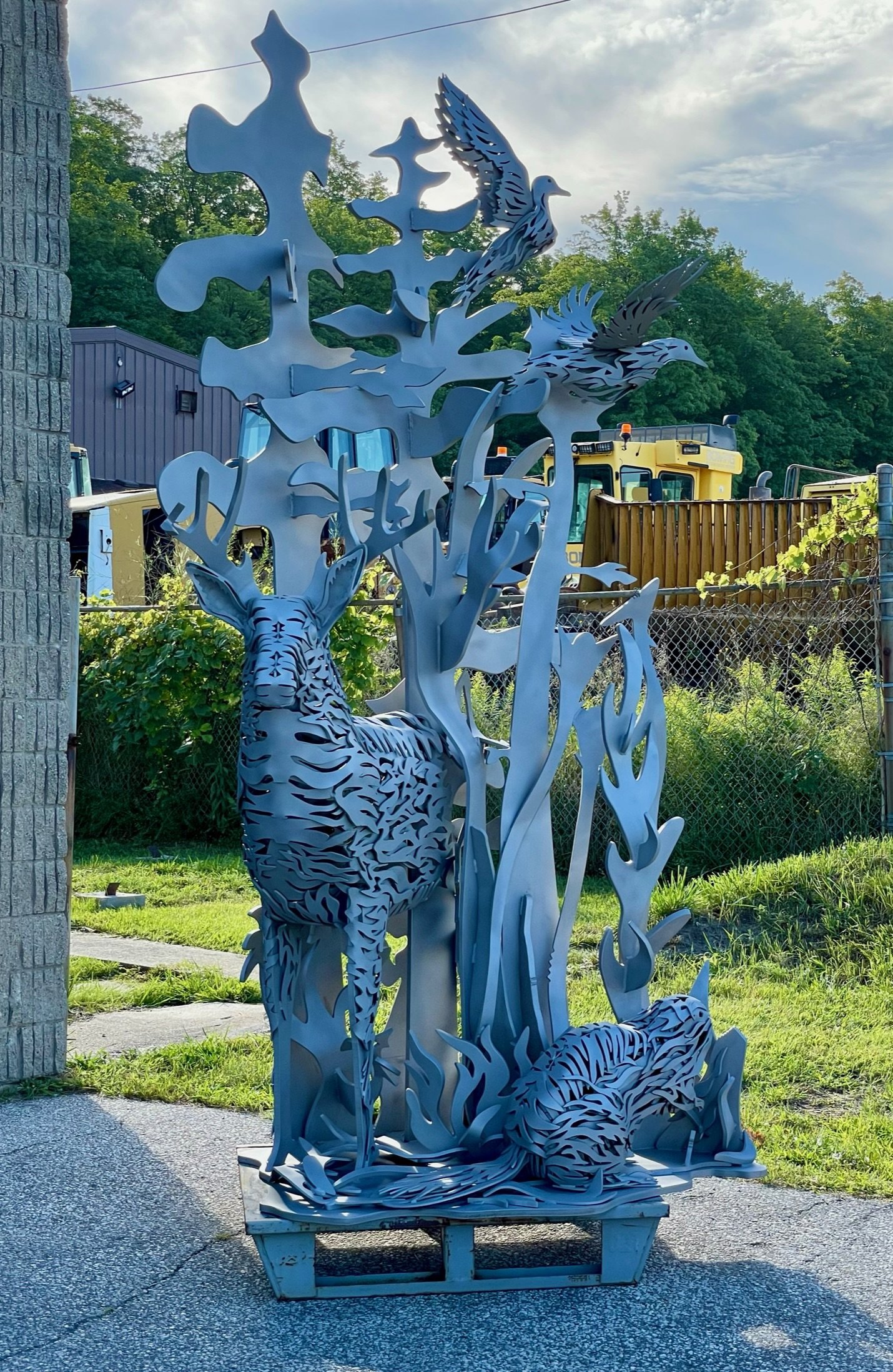 Custom steel sculpture sandblasted to bare metal
