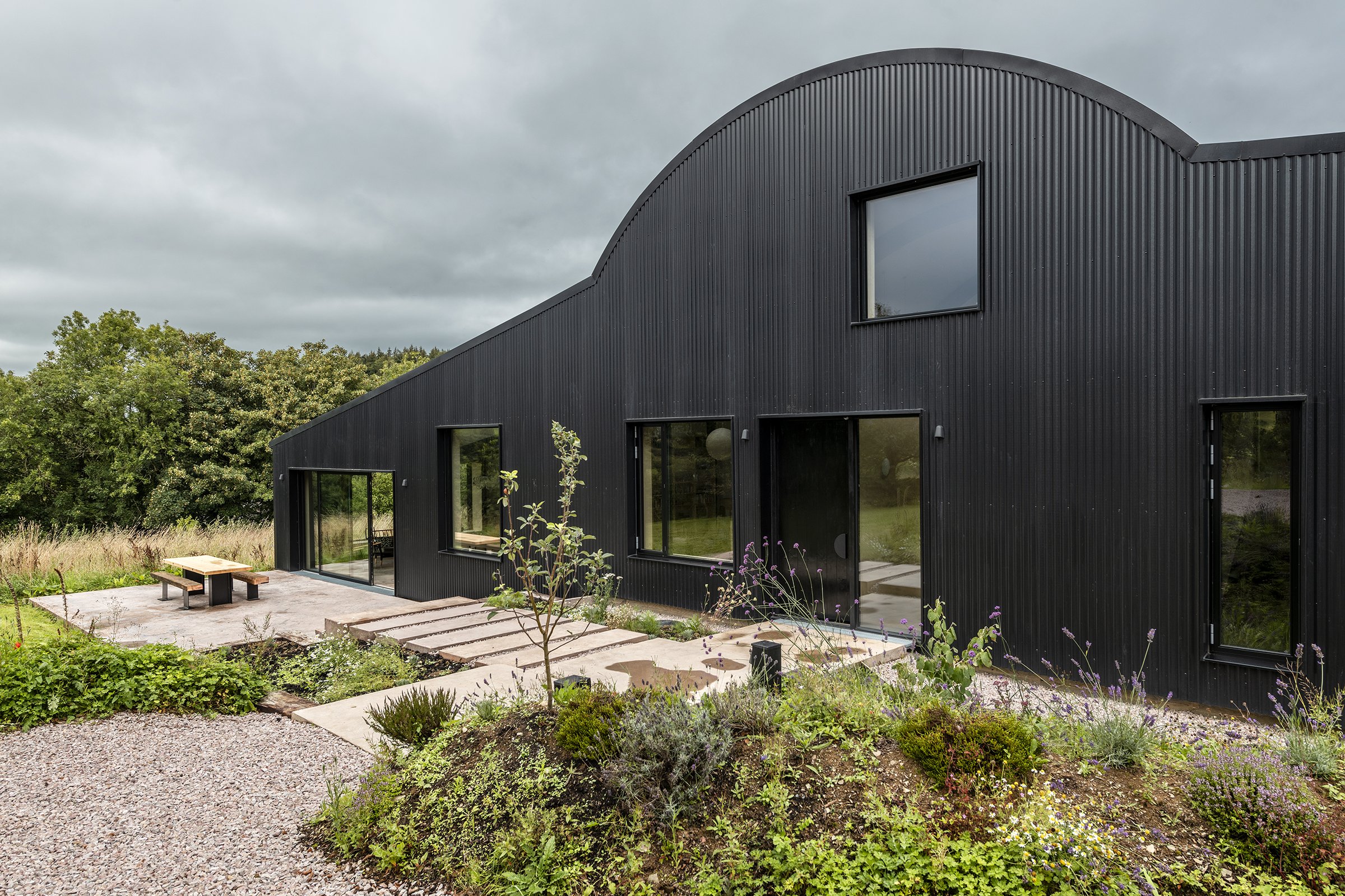 Class Q barn conversion black corrugated. cladding.jpg