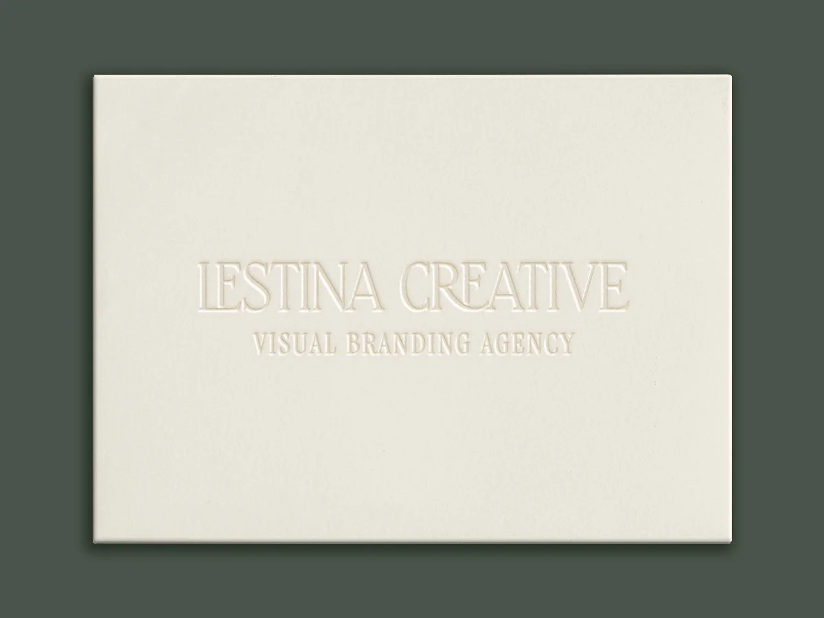 An embossed envelope featuring the logo for Lestina Creative, a visual branding agency.