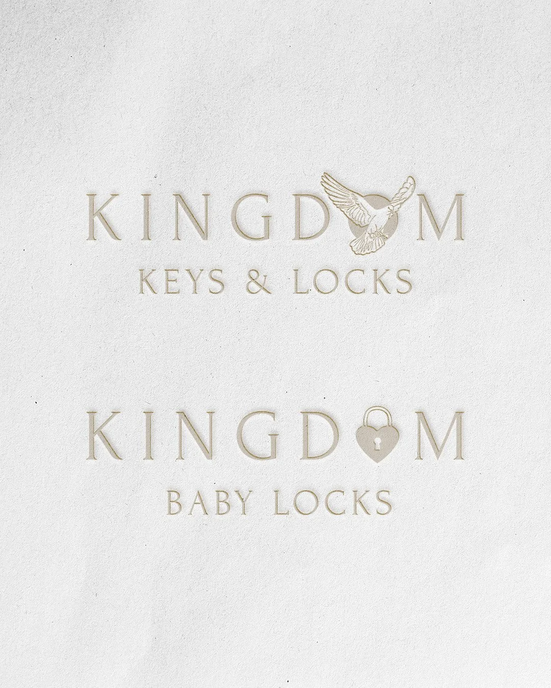 Two horizontal logos, one for Kingdom Keys & locks and one for their sub-service brand, Kingdom Baby Locks, is embossed into a paper background.
