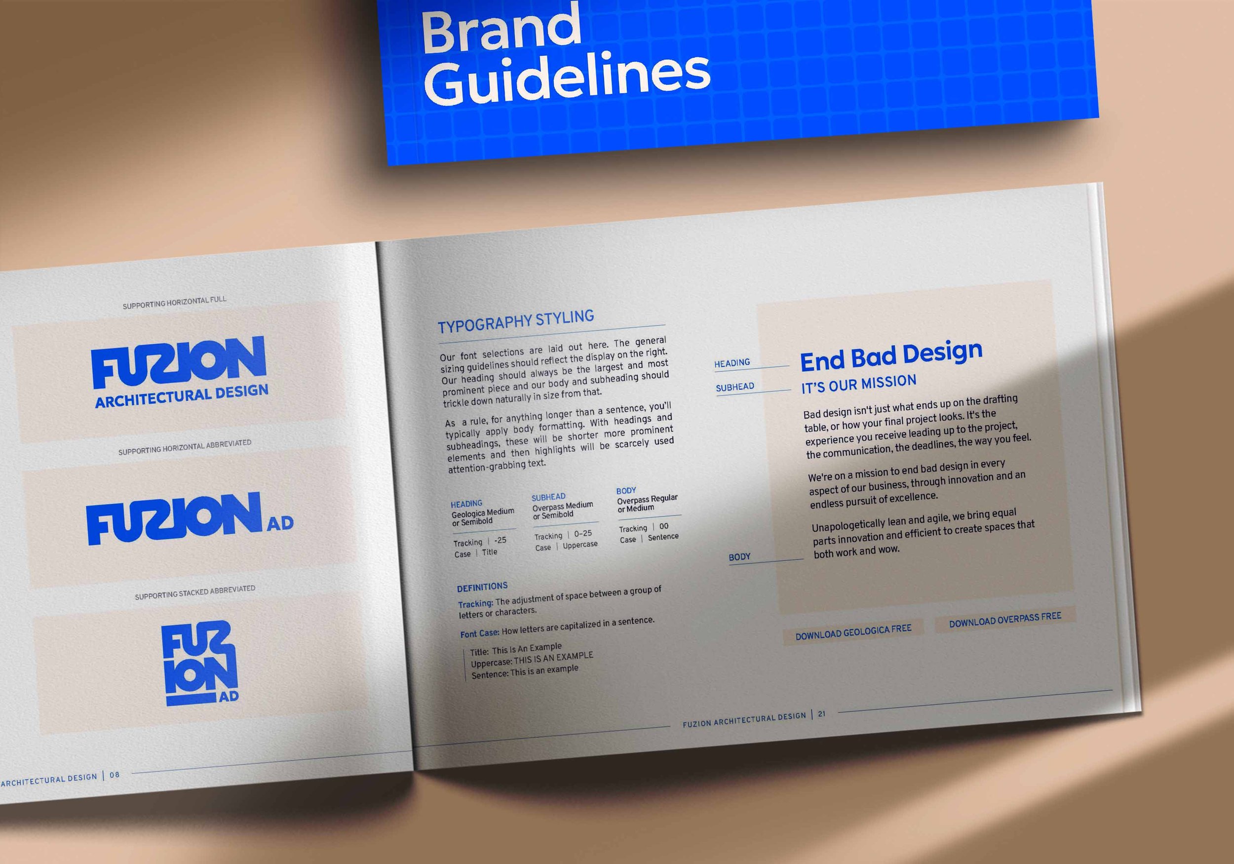 A flatlay showing brand guidelines document for FUZION Architectural Design after a rebrand project with Hearthstone Creative.