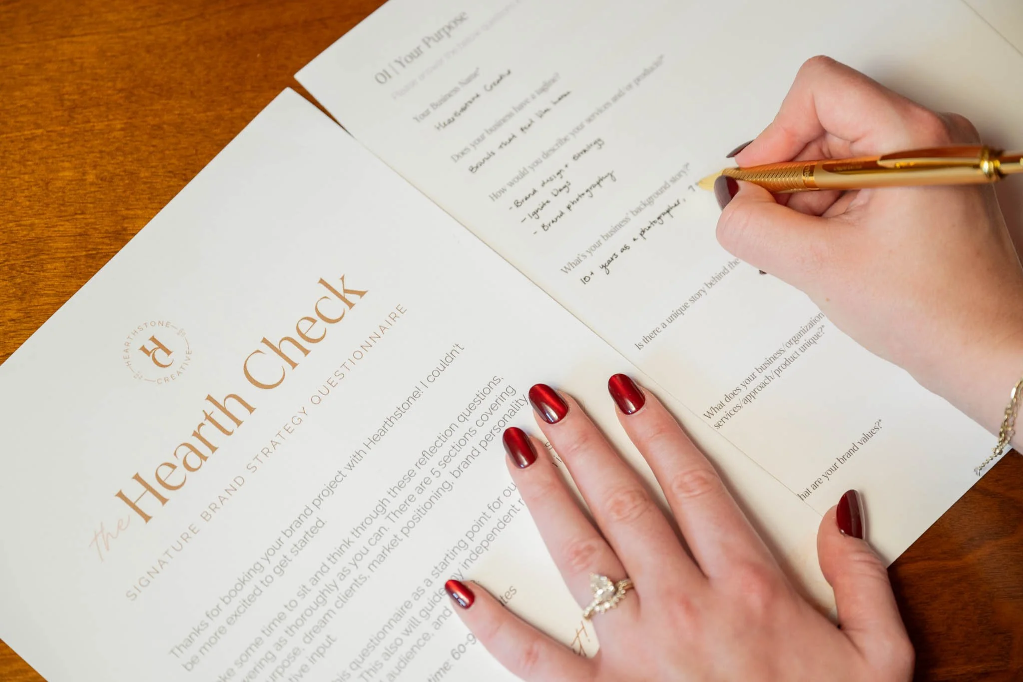 A business owner filling out the Hearth Check, our signature brand strategy questionnaire that kicks off all brand projects.