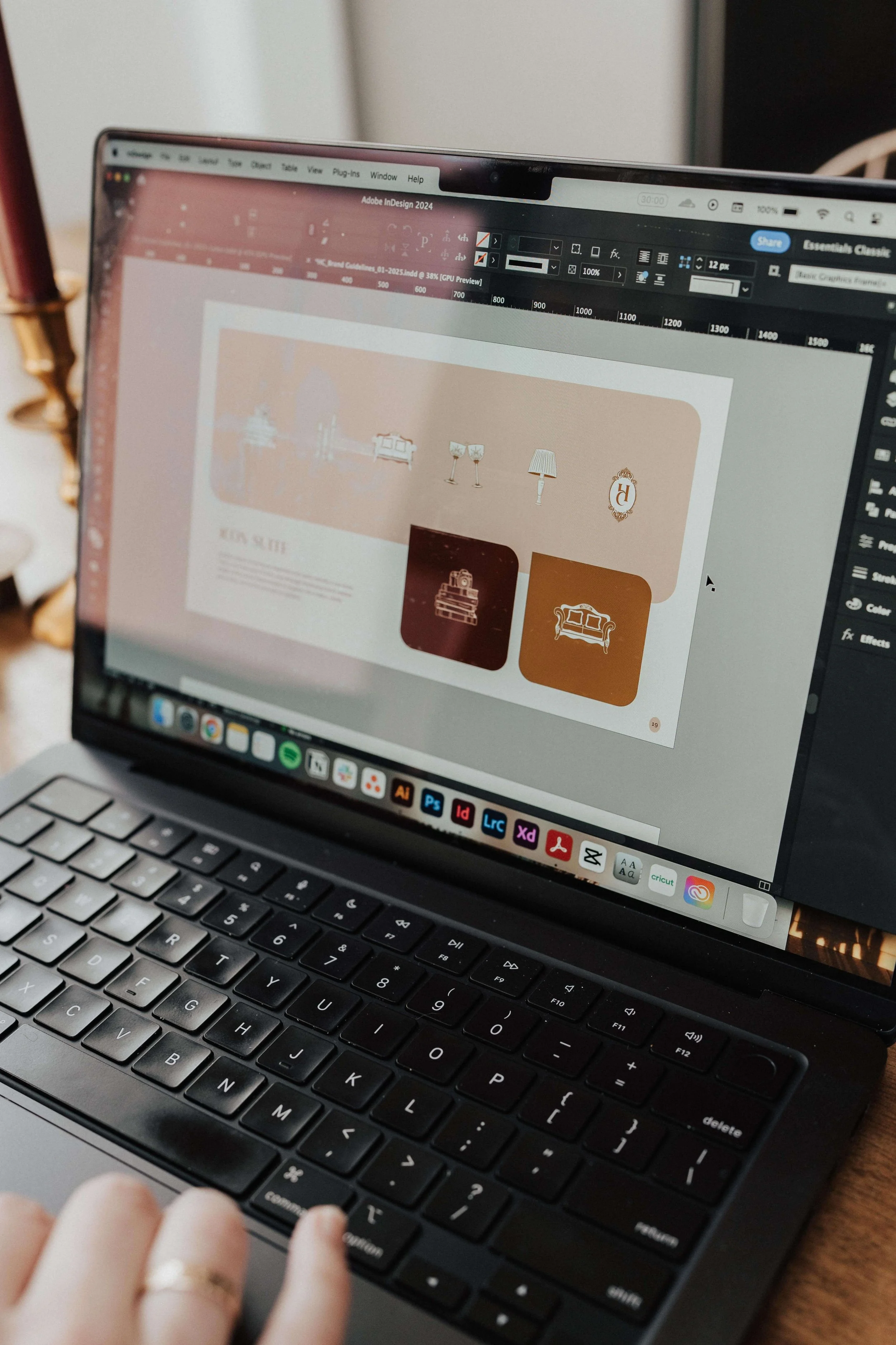A computer shows a brand identity for a creative entrepreneur.