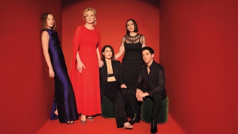 Image depicts Hacks stars and creators in a red box photo op