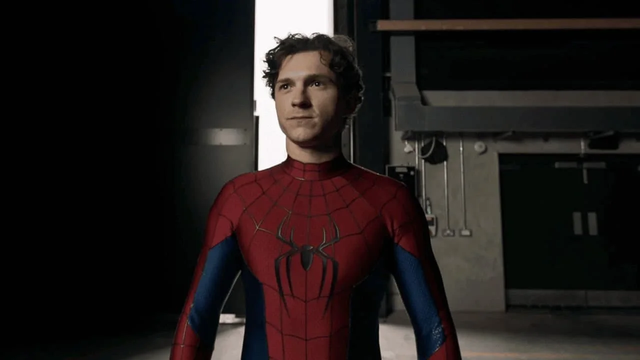 Tom Holland reveals the new Spider-Man suit for the MCU in an empty studio
