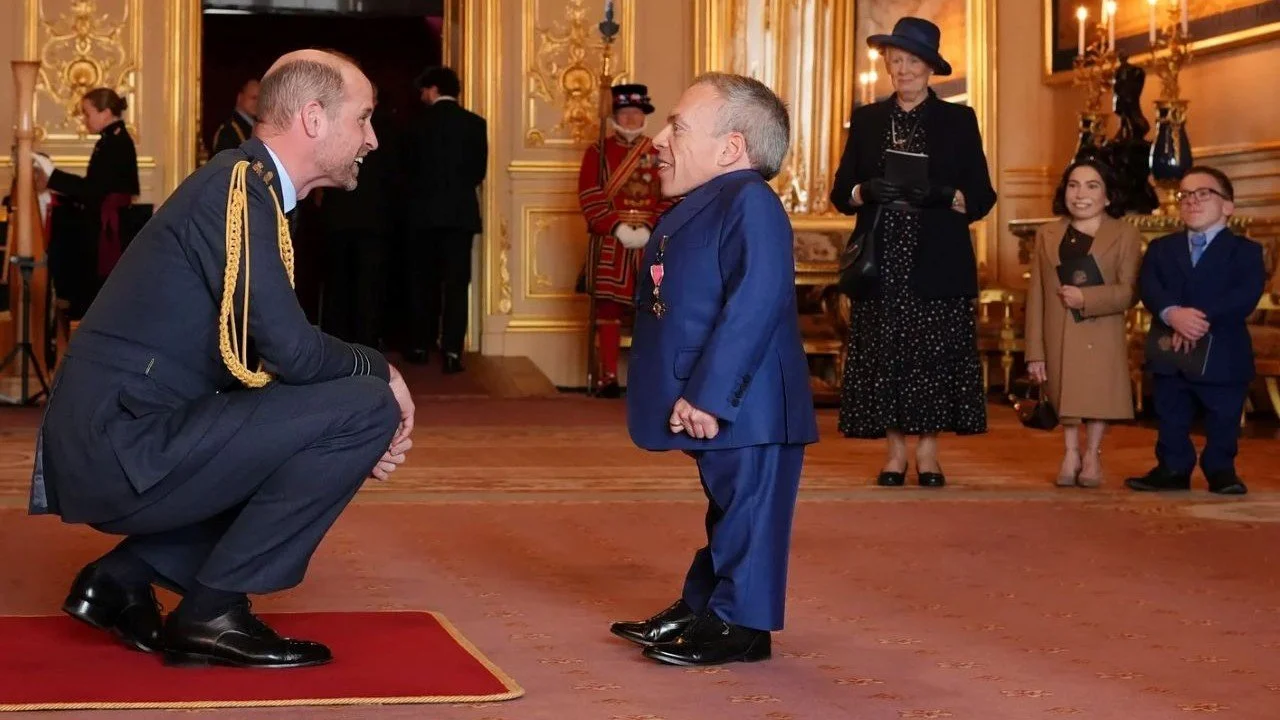 Warwick Davis Receives OBE For Services To Drama And Charity