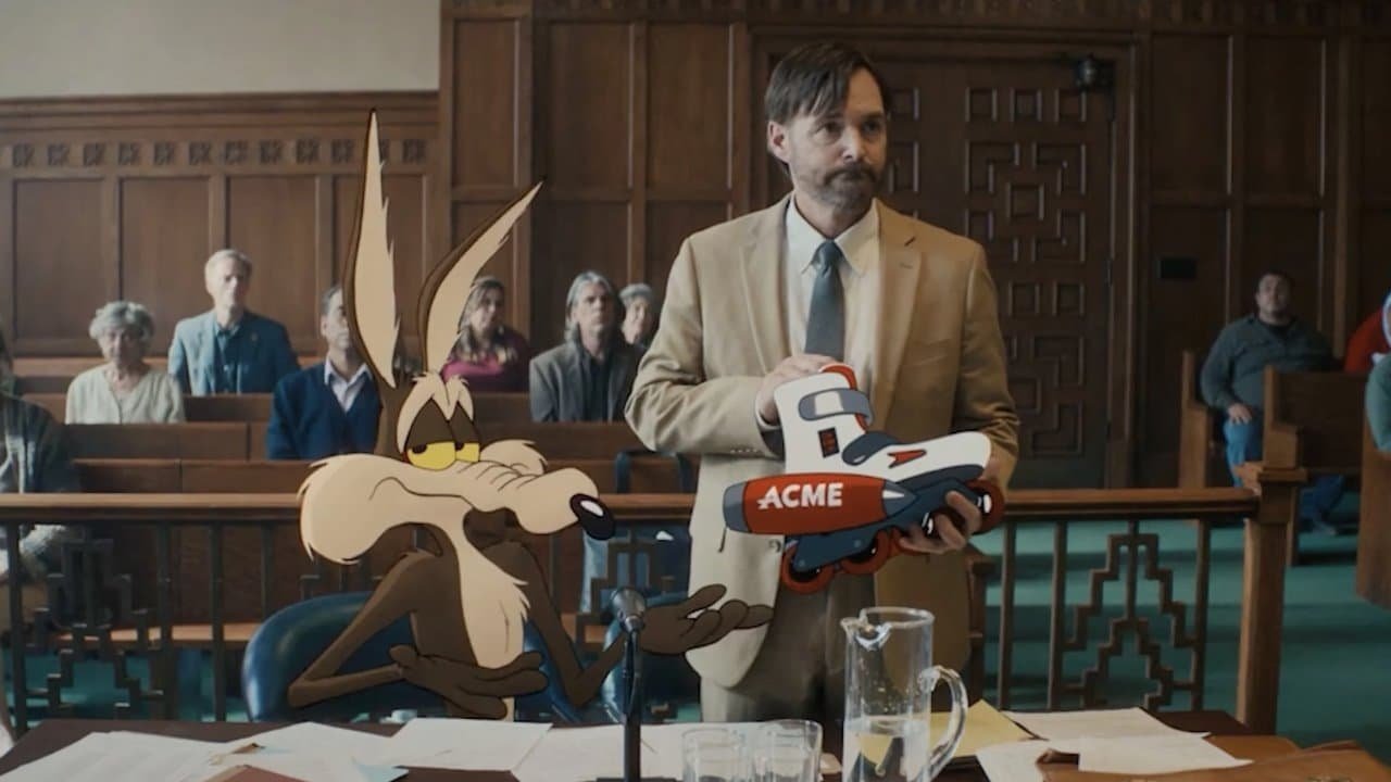 Image description: Wile E. Coyote and Will Forte as Kevin Avery in the courtroom