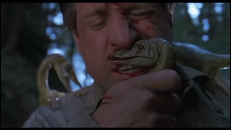 Dieter is clutching onto the compy, trying to get them off of him.