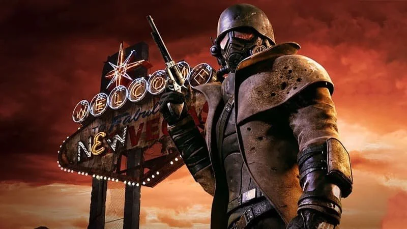 Image depicts the New Vegas sign and the desert wasteland character with New California Republic Ranger gear from the game.  Image Source: IGN