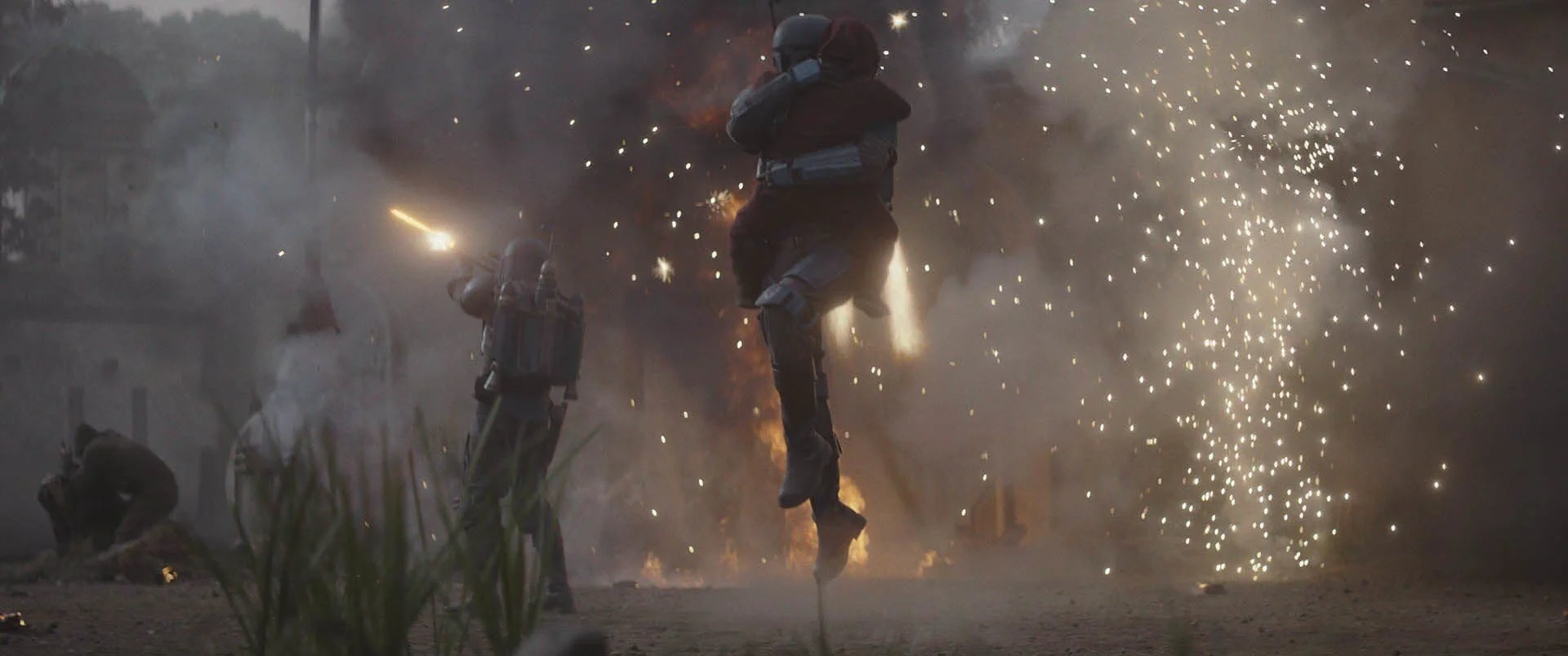 Death Watch arrives and takes the young Din Djarin to safety