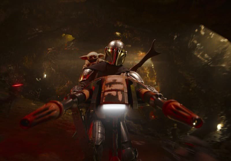 Din Djarin and Grogu gunning down Gotra droids atop a stolen STAP,  Image Source: StarWars.com