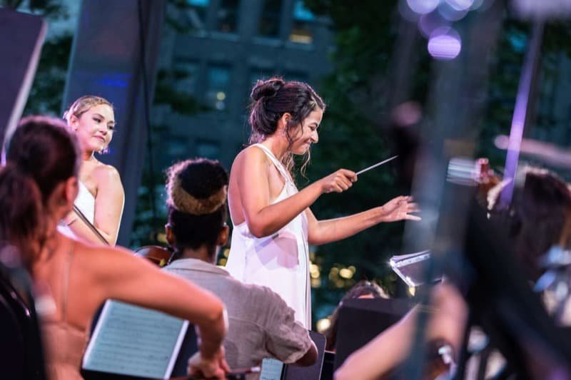 Macy Schmidt conducting