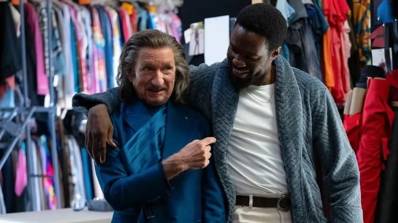 Ben Kingsley as Trevor Slattery and Yahya Abdul Manteen II as Simon Williams