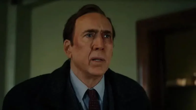 Nicholas Cage as Ben Reilly with a black eye and a bruised face 