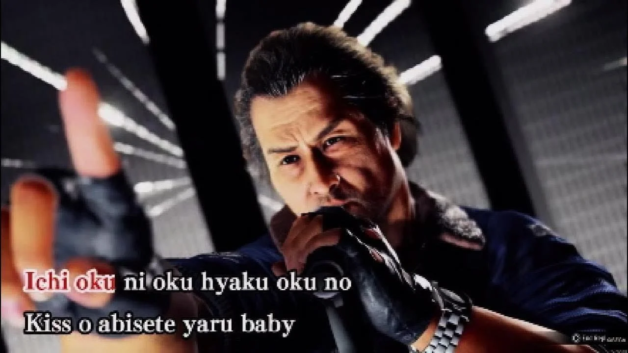 Image Desc: Adachi singing karaoke