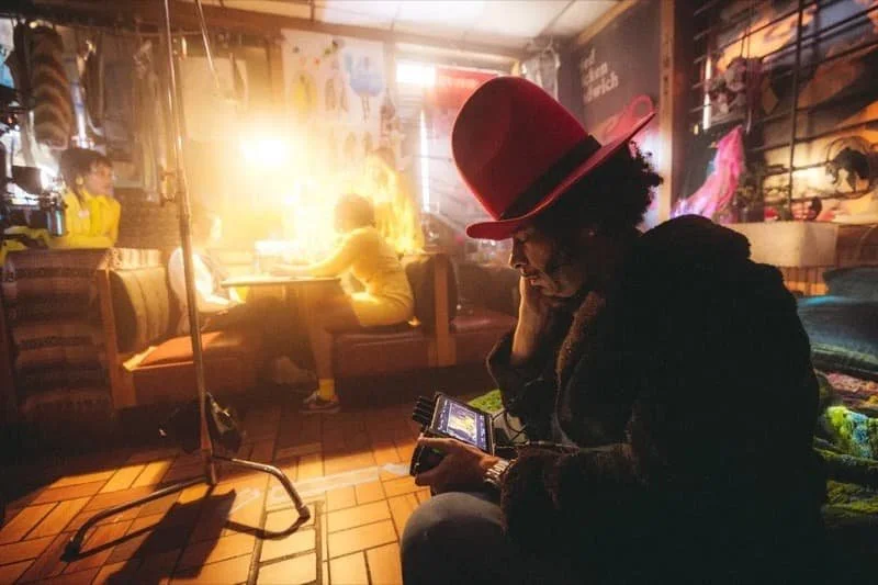 Boots Riley on the set of I Love Boosters  Image Source: Variety