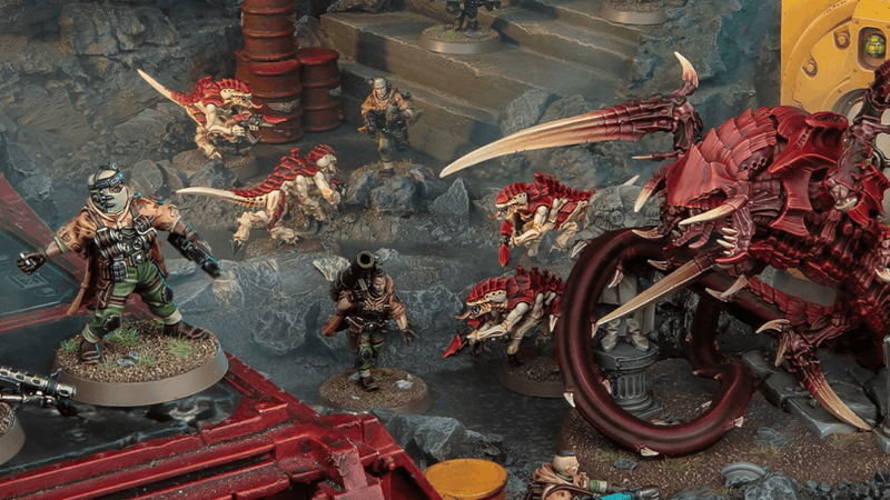 Cadian soldiers face off against a huge, lethal, Tyranid organism