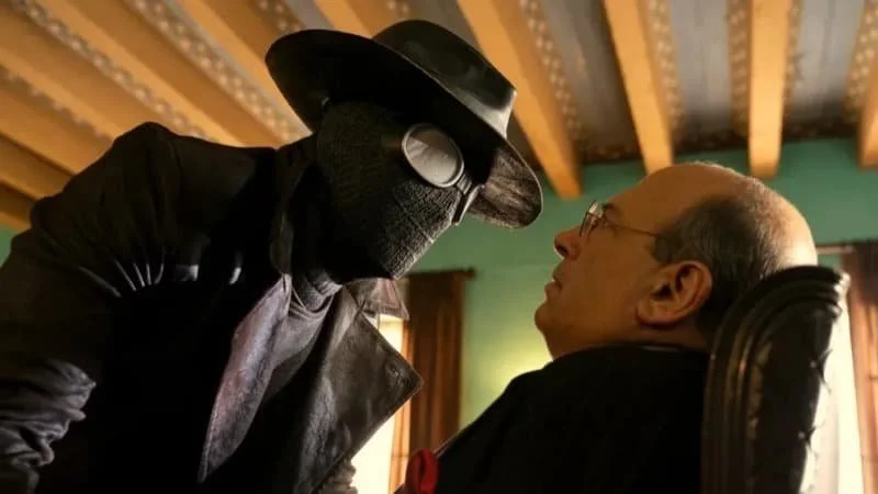 Nicolas Cage as The Spider and Michael Kostroff as Mayor Alfred Morris