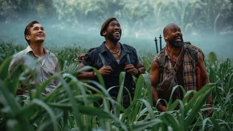 LeClerc (right) with Henry (left) and Duncan (middle) in awe of the dinosaurs.