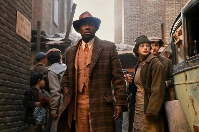 Lamorne Morris as Robbie Robertson in Spider-Noir