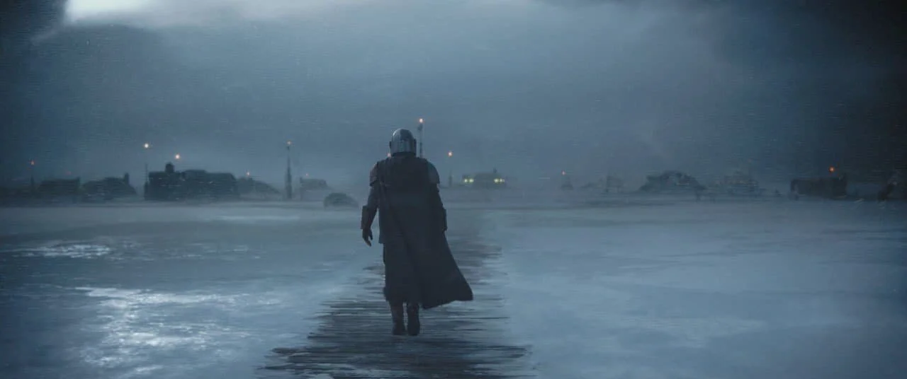 Din Djarin walking the surface of Pagodon