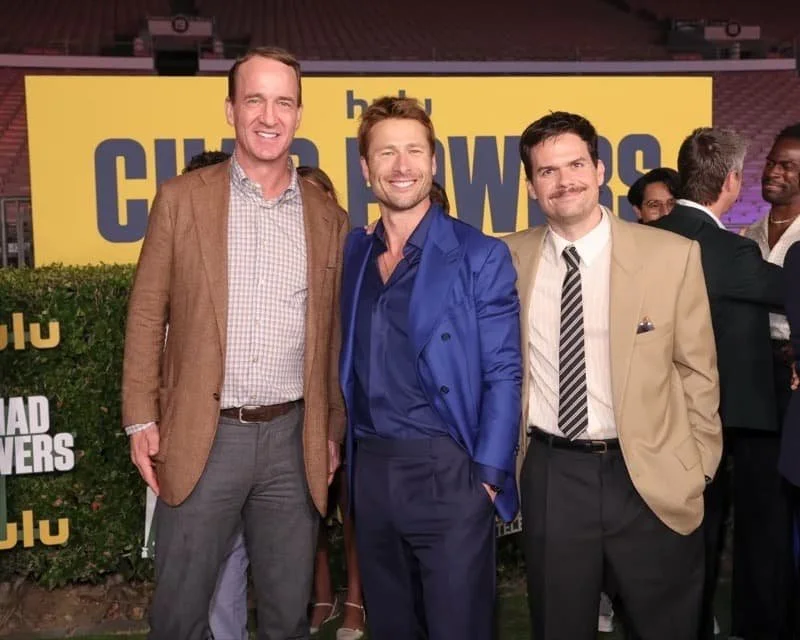 Peyton Manning, Glen Powell, and Michael Waldron at the premiere of Chad Powers in 2025  Image Source: Variety