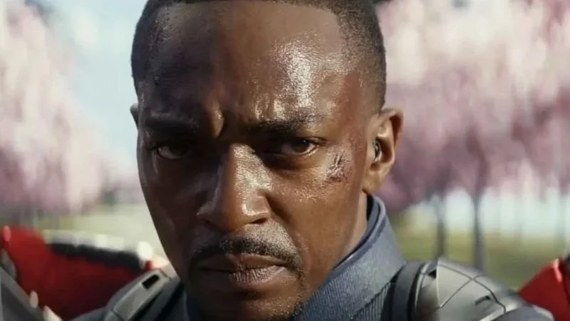 Anthony Mackie as Captain America in Captain America: Brave New World (2025). Mackie is featured close-up with a headshot, a serious look on his face.