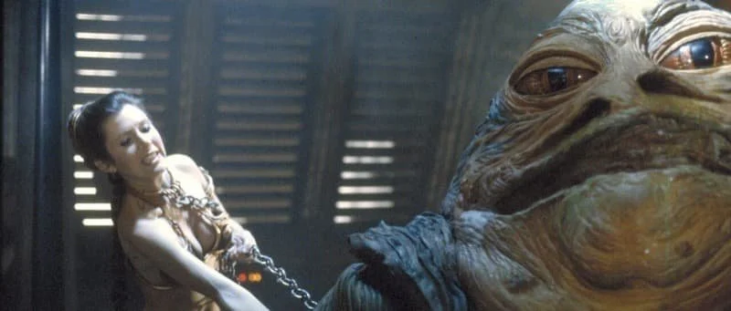 Leia Organa choking Jabba the Hutt to death using a chain  Image Source: StarWars.com