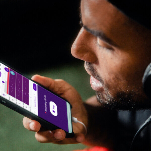 Man talking to mobile phone assistant